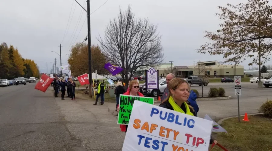 Striking Nurses Rally Outside Health Unit