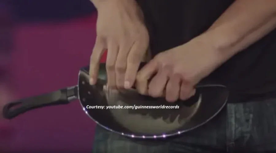 Super Strong Woman Rolls Up Frying Pans!