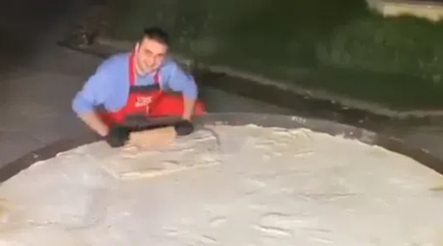 WATCH: How big do you think this pizza is?