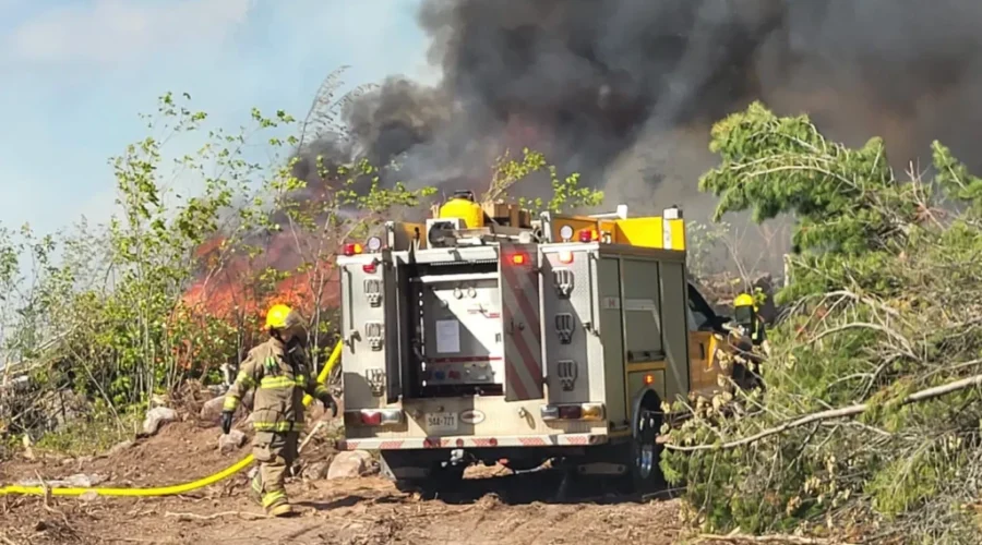 Crews Monitoring Wildfire North Of HWY 11/17