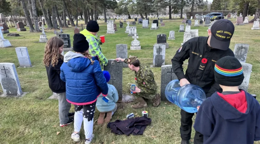 Students helping clean veteran headstones ahead of Remembrance Day
