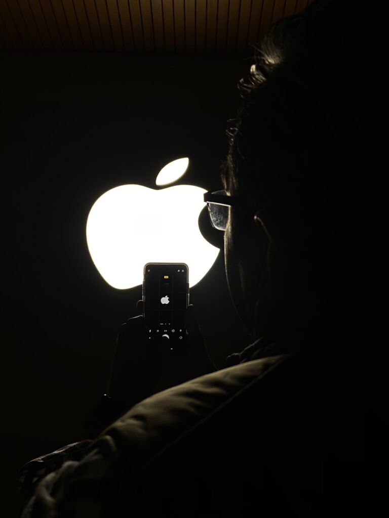 person holding black iphone 5