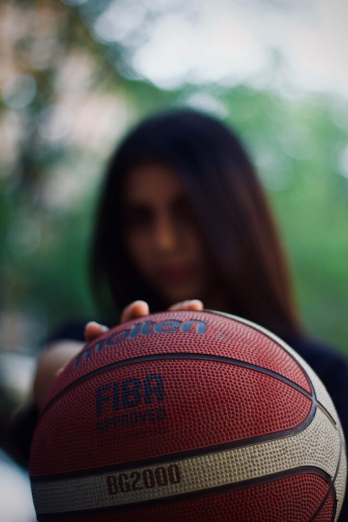 a woman holding a drum