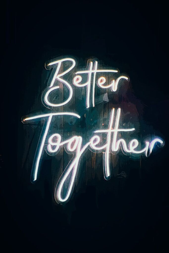 a neon sign that says better together