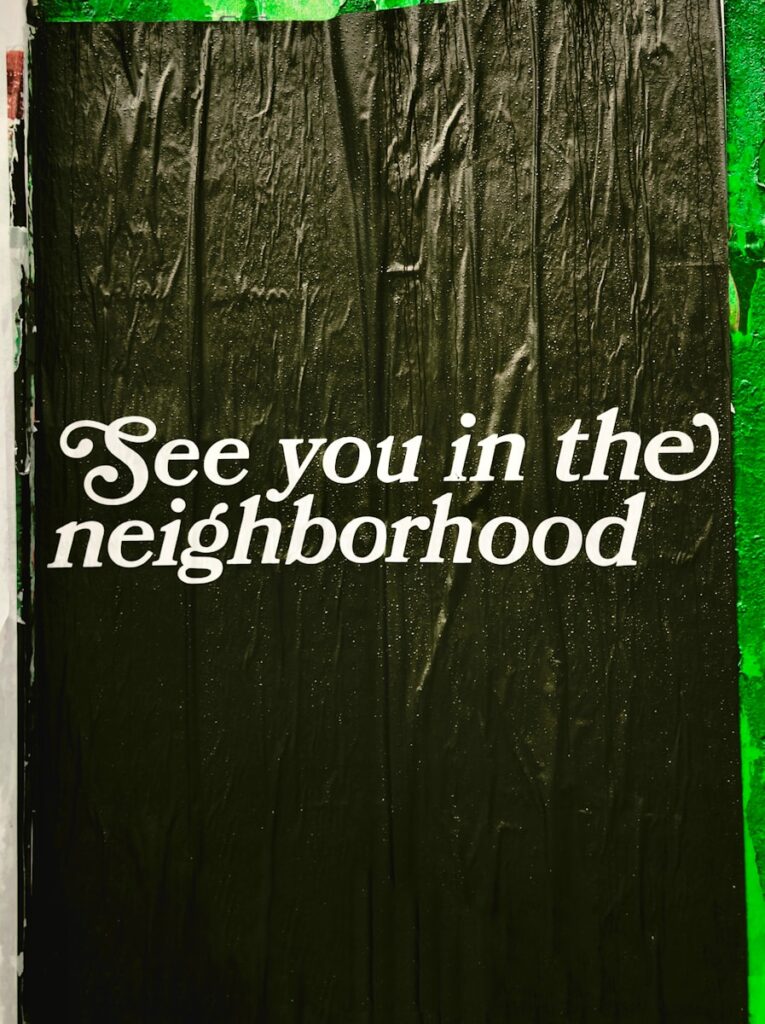 See you in the neighborhood text on wall