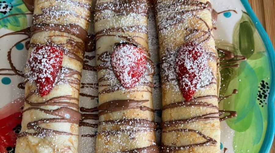 Strawberry‑stuffed crêpes with a glossy chocolate drizzle… and endless filling ideas to inspire your next batch!